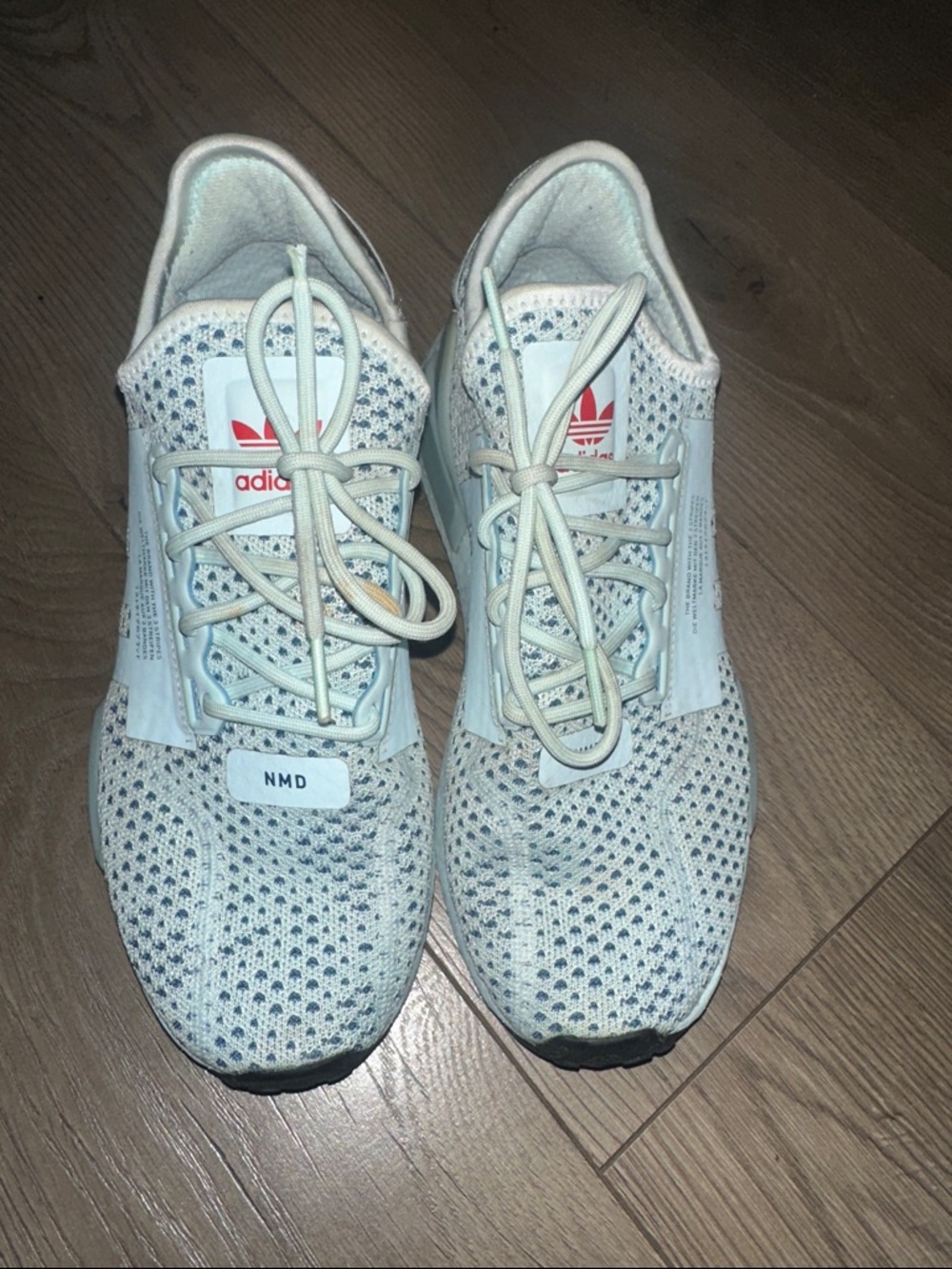 adidas NMD R1 Primeknit Women’s Sneakers in Off-White